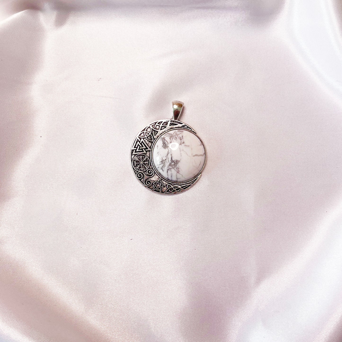 Moon and sun pendant