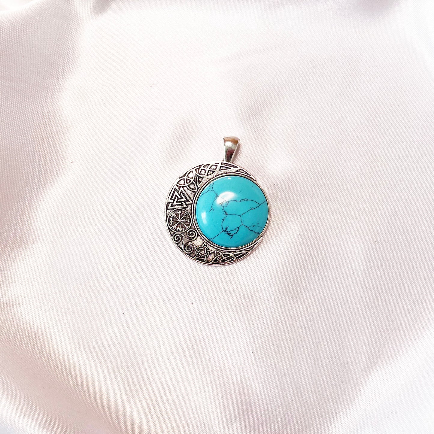 Moon and sun pendant